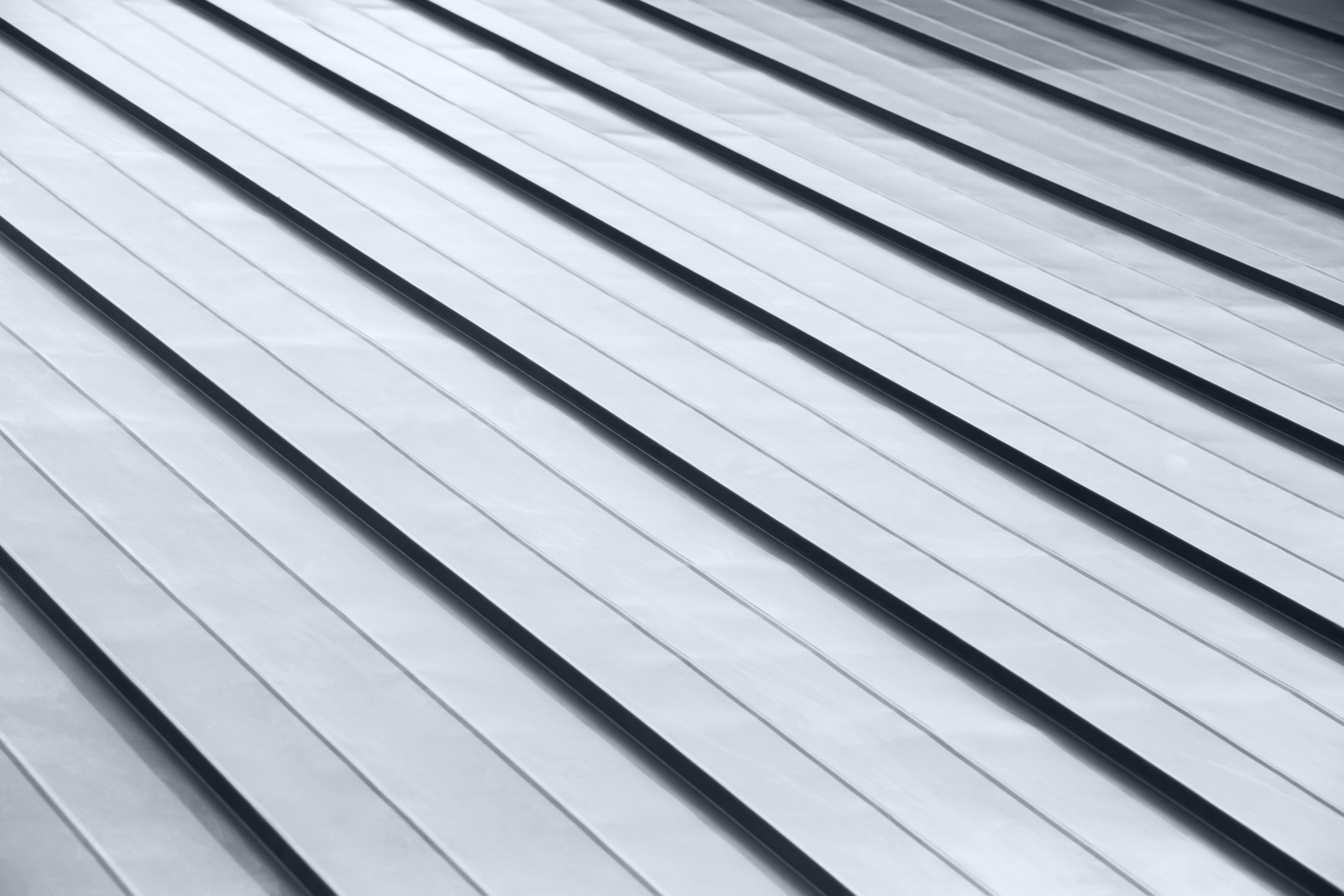 New corrugated metallic gray roof surface background